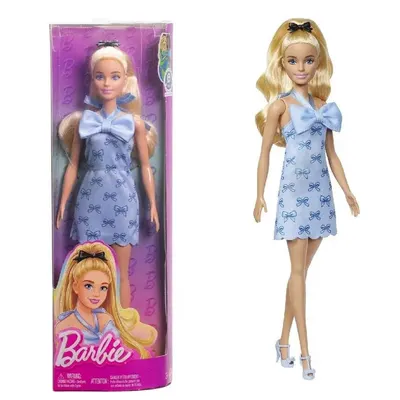 Poupée mannequin blonde à robe bleue ornée de nœuds